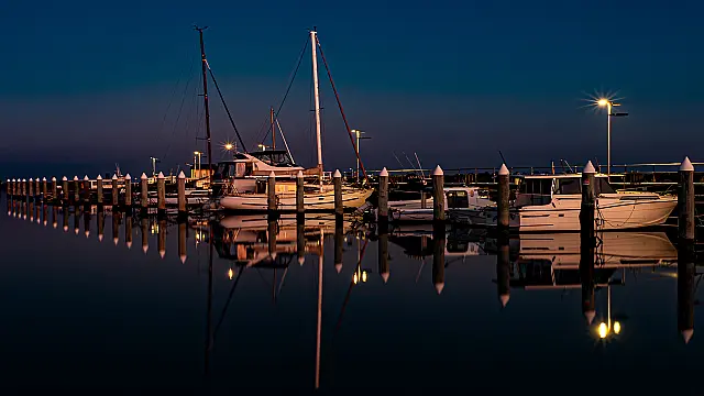 Moored Boats At Sunset