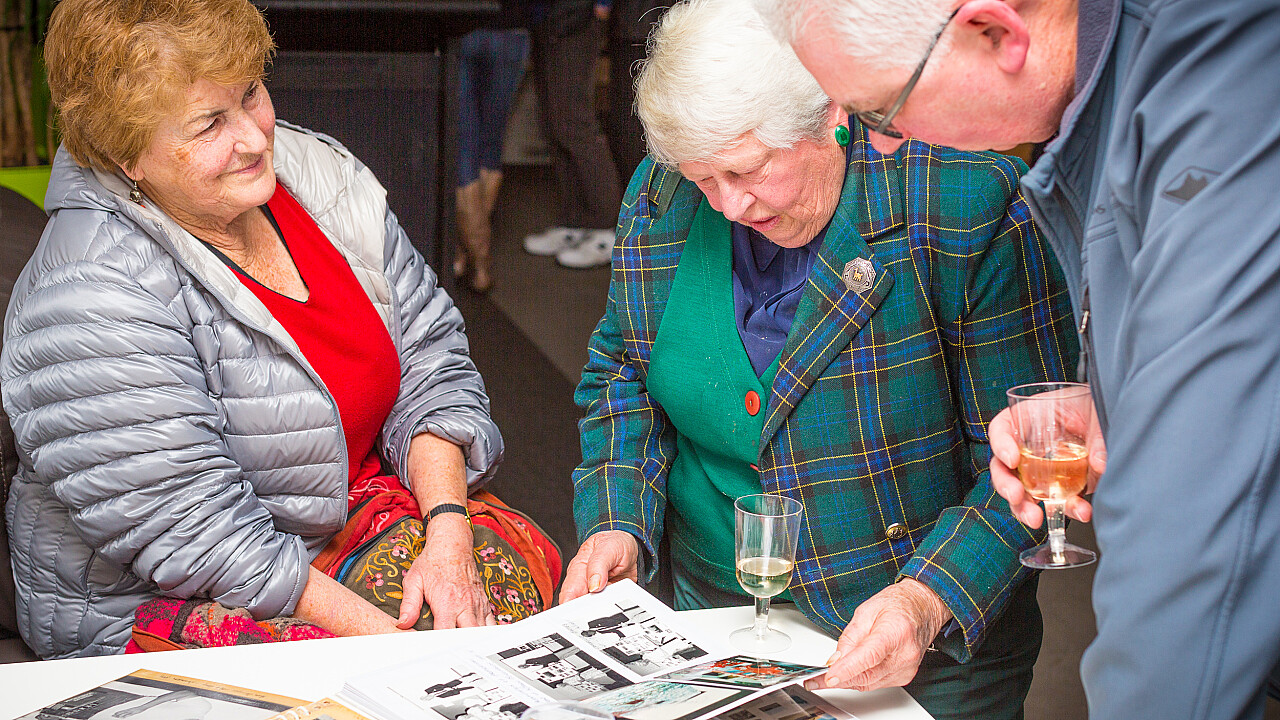 Members look through our history books