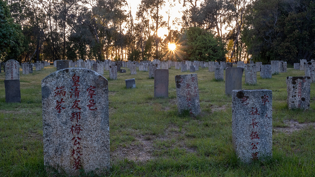 Chinese graves at sunrise
